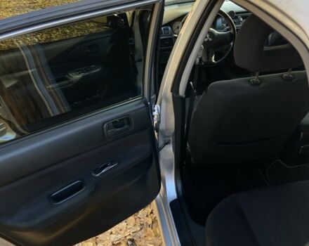 Серый Мицубиси Лансер, объемом двигателя 1.6 л и пробегом 204 тыс. км за 3999 $, фото 8 на Automoto.ua