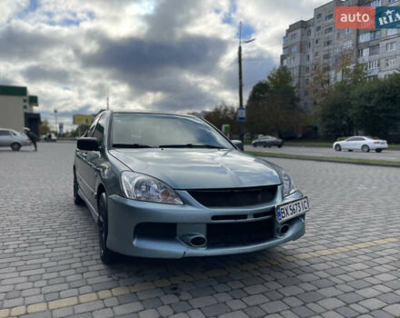 Серый Мицубиси Лансер, объемом двигателя 1.58 л и пробегом 350 тыс. км за 3300 $, фото 5 на Automoto.ua
