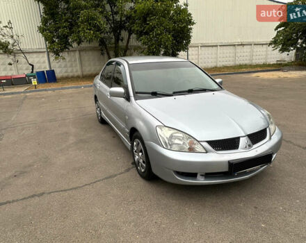 Серый Мицубиси Лансер, объемом двигателя 1.58 л и пробегом 183 тыс. км за 4800 $, фото 17 на Automoto.ua