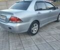 Мицубиси Лансер 2006 в Каменское - Днепродзержинск на Automoto.ua Серый Мицубиси Лансер, объемом двигателя 1.58 л и пробегом 238 тыс. км за 5400 $, фото 1 на Automoto.ua