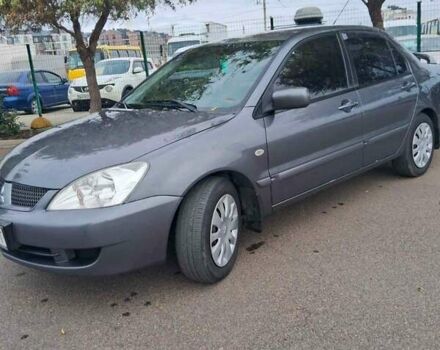 Сірий Міцубісі Lancer, об'ємом двигуна 1.6 л та пробігом 229 тис. км за 4900 $, фото 24 на Automoto.ua