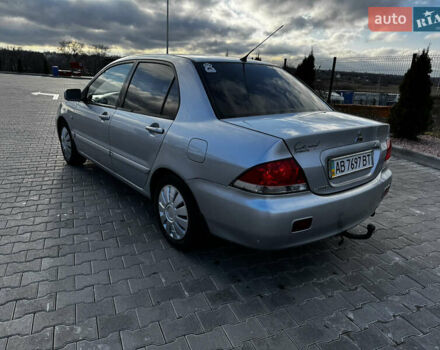Сірий Міцубісі Lancer, об'ємом двигуна 1.58 л та пробігом 333 тис. км за 2700 $, фото 6 на Automoto.ua