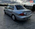 Сірий Міцубісі Lancer, об'ємом двигуна 1.58 л та пробігом 333 тис. км за 2700 $, фото 6 на Automoto.ua