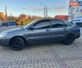 Серый Мицубиси Лансер, объемом двигателя 1.6 л и пробегом 279 тыс. км за 3990 $, фото 3 на Automoto.ua