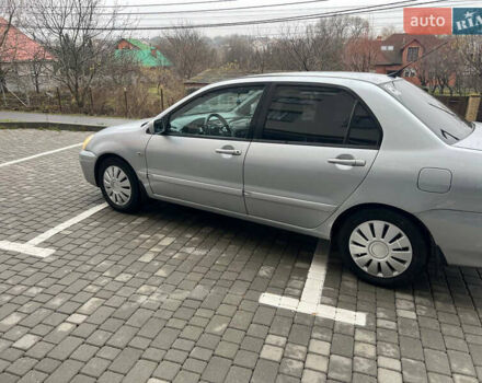 Сірий Міцубісі Lancer, об'ємом двигуна 1.58 л та пробігом 333 тис. км за 2999 $, фото 8 на Automoto.ua