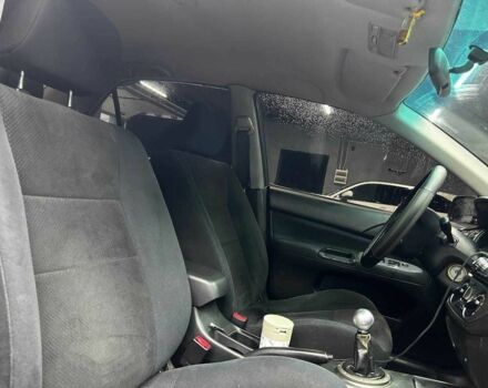 Серый Мицубиси Лансер, объемом двигателя 1.6 л и пробегом 300 тыс. км за 4600 $, фото 11 на Automoto.ua