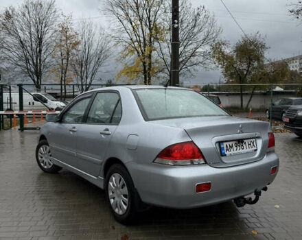 Міцубісі Lancer 2006 у Житомирі на Automoto.ua Сірий Міцубісі Lancer, об'ємом двигуна 1.58 л та пробігом 195 тис. км за 4999 $, фото 8 на Automoto.ua
