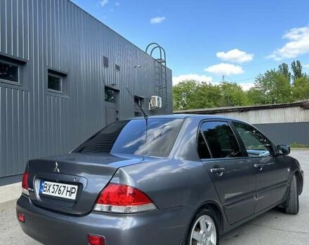 Серый Мицубиси Лансер, объемом двигателя 1.58 л и пробегом 160 тыс. км за 4600 $, фото 11 на Automoto.ua