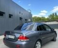 Серый Мицубиси Лансер, объемом двигателя 1.58 л и пробегом 160 тыс. км за 4600 $, фото 11 на Automoto.ua