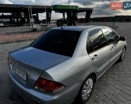 Сірий Міцубісі Lancer, об'ємом двигуна 1.58 л та пробігом 333 тис. км за 2500 $, фото 3 на Automoto.ua