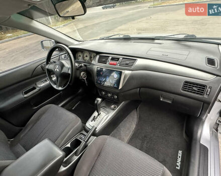 Серый Мицубиси Лансер, объемом двигателя 1.58 л и пробегом 183 тыс. км за 4800 $, фото 21 на Automoto.ua