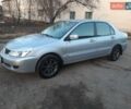 Серый Мицубиси Лансер, объемом двигателя 1.58 л и пробегом 187 тыс. км за 2699 $, фото 5 на Automoto.ua
