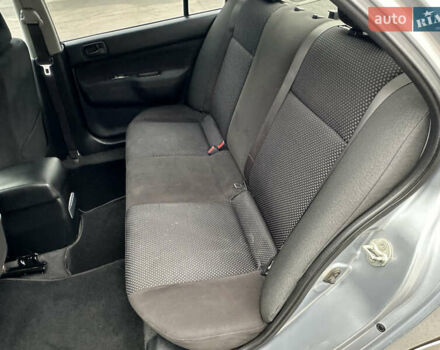 Серый Мицубиси Лансер, объемом двигателя 1.58 л и пробегом 183 тыс. км за 4800 $, фото 28 на Automoto.ua