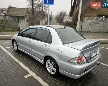 Сірий Міцубісі Lancer, об'ємом двигуна 2 л та пробігом 187 тис. км за 4500 $, фото 4 на Automoto.ua