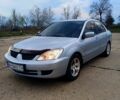 Сірий Міцубісі Lancer, об'ємом двигуна 1.6 л та пробігом 220 тис. км за 5300 $, фото 1 на Automoto.ua