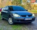Сірий Міцубісі Lancer, об'ємом двигуна 1.6 л та пробігом 240 тис. км за 4200 $, фото 1 на Automoto.ua