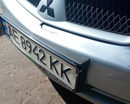 Сірий Міцубісі Lancer, об'ємом двигуна 1.58 л та пробігом 265 тис. км за 2900 $, фото 9 на Automoto.ua