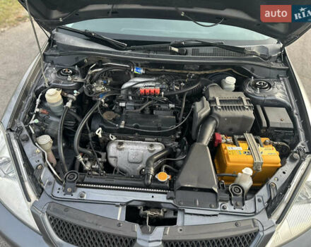 Сірий Міцубісі Lancer, об'ємом двигуна 1.58 л та пробігом 332 тис. км за 4650 $, фото 7 на Automoto.ua