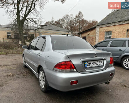 Сірий Міцубісі Lancer, об'ємом двигуна 1.58 л та пробігом 308 тис. км за 3700 $, фото 4 на Automoto.ua