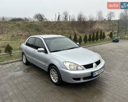 Сірий Міцубісі Lancer, об'ємом двигуна 1.6 л та пробігом 223 тис. км за 3900 $, фото 1 на Automoto.ua