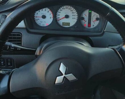 Сірий Міцубісі Lancer, об'ємом двигуна 1.58 л та пробігом 207 тис. км за 4300 $, фото 13 на Automoto.ua