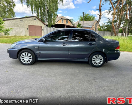 Серый Мицубиси Лансер, объемом двигателя 1.6 л и пробегом 188 тыс. км за 5490 $, фото 2 на Automoto.ua