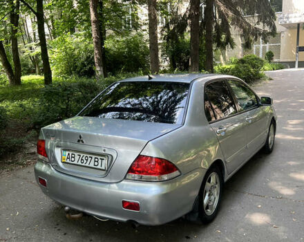 Сірий Міцубісі Lancer, об'ємом двигуна 1.6 л та пробігом 331 тис. км за 3100 $, фото 3 на Automoto.ua