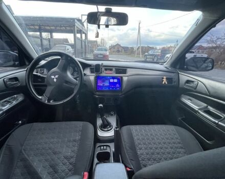 Серый Мицубиси Лансер, объемом двигателя 1.6 л и пробегом 213 тыс. км за 4450 $, фото 7 на Automoto.ua