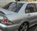 Серый Мицубиси Лансер, объемом двигателя 2 л и пробегом 284 тыс. км за 4100 $, фото 6 на Automoto.ua