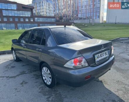 Сірий Міцубісі Lancer, об'ємом двигуна 1.58 л та пробігом 276 тис. км за 3650 $, фото 8 на Automoto.ua