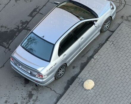 Серый Мицубиси Лансер, объемом двигателя 2 л и пробегом 256 тыс. км за 7000 $, фото 11 на Automoto.ua