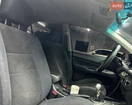 Серый Мицубиси Лансер, объемом двигателя 1.58 л и пробегом 300 тыс. км за 4600 $, фото 11 на Automoto.ua