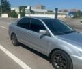 Серый Мицубиси Лансер, объемом двигателя 1.6 л и пробегом 230 тыс. км за 2850 $, фото 1 на Automoto.ua