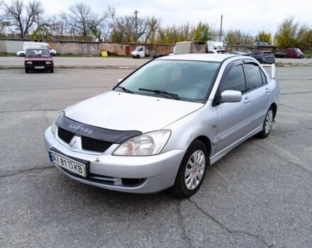 Сірий Міцубісі Lancer, об'ємом двигуна 1.6 л та пробігом 300 тис. км за 2999 $, фото 1 на Automoto.ua