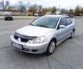 Сірий Міцубісі Lancer, об'ємом двигуна 1.6 л та пробігом 300 тис. км за 2999 $, фото 1 на Automoto.ua