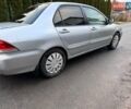 Сірий Міцубісі Lancer, об'ємом двигуна 1.58 л та пробігом 333 тис. км за 2750 $, фото 7 на Automoto.ua