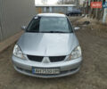 Сірий Міцубісі Lancer, об'ємом двигуна 1.6 л та пробігом 167 тис. км за 6500 $, фото 1 на Automoto.ua