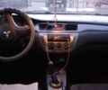 Серый Мицубиси Лансер, объемом двигателя 1.6 л и пробегом 275 тыс. км за 5200 $, фото 12 на Automoto.ua