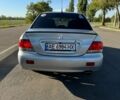 Серый Мицубиси Лансер, объемом двигателя 1.6 л и пробегом 230 тыс. км за 4300 $, фото 6 на Automoto.ua