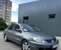 Серый Мицубиси Лансер, объемом двигателя 1.58 л и пробегом 160 тыс. км за 4600 $, фото 1 на Automoto.ua