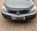 Серый Мицубиси Лансер, объемом двигателя 1.6 л и пробегом 170 тыс. км за 4700 $, фото 1 на Automoto.ua