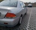 Сірий Міцубісі Lancer, об'ємом двигуна 1.6 л та пробігом 267 тис. км за 3600 $, фото 2 на Automoto.ua