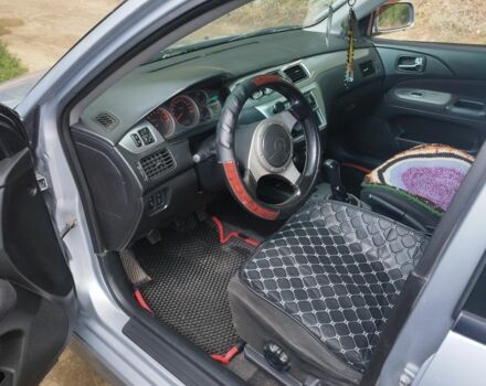 Серый Мицубиси Лансер, объемом двигателя 2 л и пробегом 306 тыс. км за 4100 $, фото 1 на Automoto.ua