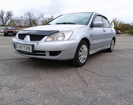 Сірий Міцубісі Lancer, об'ємом двигуна 1.6 л та пробігом 300 тис. км за 2999 $, фото 2 на Automoto.ua
