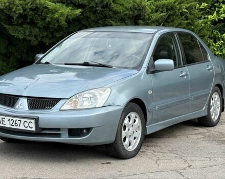 Серый Мицубиси Лансер, объемом двигателя 1.6 л и пробегом 220 тыс. км за 4400 $, фото 1 на Automoto.ua