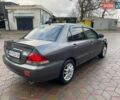 Сірий Міцубісі Lancer, об'ємом двигуна 1.6 л та пробігом 262 тис. км за 4400 $, фото 3 на Automoto.ua
