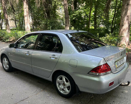 Сірий Міцубісі Lancer, об'ємом двигуна 1.6 л та пробігом 333 тис. км за 2600 $, фото 4 на Automoto.ua