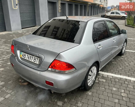 Серый Мицубиси Лансер, объемом двигателя 1.58 л и пробегом 333 тыс. км за 2800 $, фото 5 на Automoto.ua