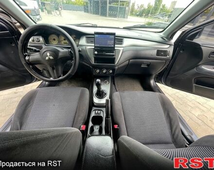 Сірий Міцубісі Lancer, об'ємом двигуна 1.6 л та пробігом 162 тис. км за 4650 $, фото 7 на Automoto.ua
