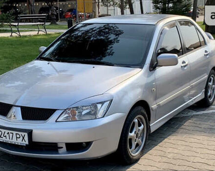 Сірий Міцубісі Lancer, об'ємом двигуна 1.58 л та пробігом 190 тис. км за 4900 $, фото 1 на Automoto.ua